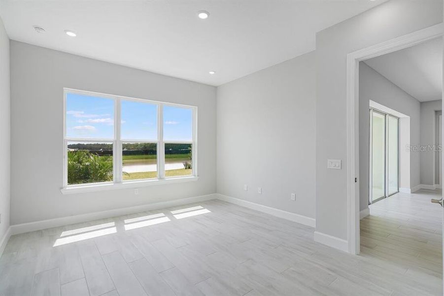 Spacious, unfurnished interior of a new home in Esplanade at Westview, Kissimmee (Image 27).