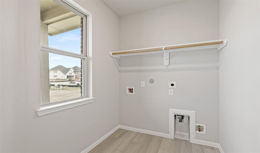 Laundry room (*Photo not of actual home and used for illustration purposes only.)