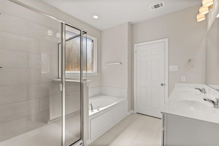 Furnished interior view inside a new home in Spring Creek Trails, Magnolia (Image 6).