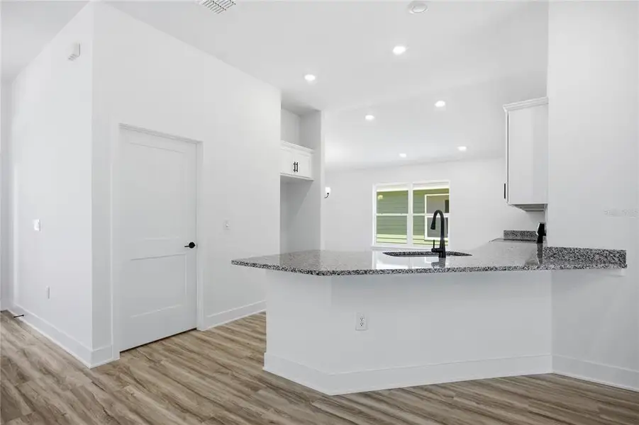Furnished interior view inside a new home in Briarwood, Alachua (Image 4).