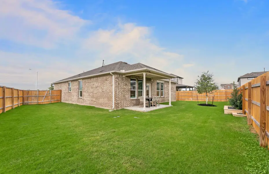 Exterior details and patio area of a home in Crosswinds, Kyle (Image 3).