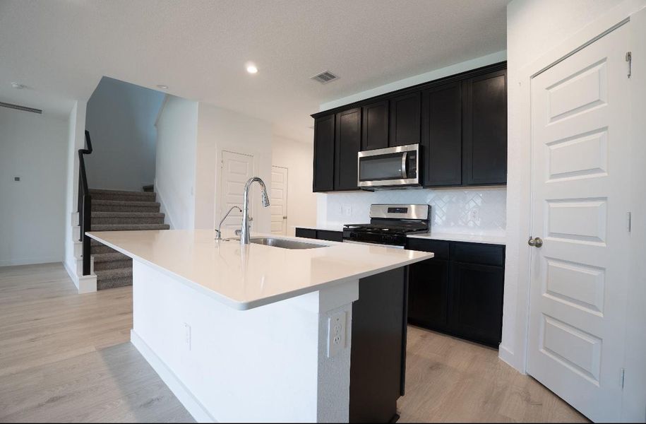 Furnished interior view inside a new home in Tamarron, Katy (Image 6).