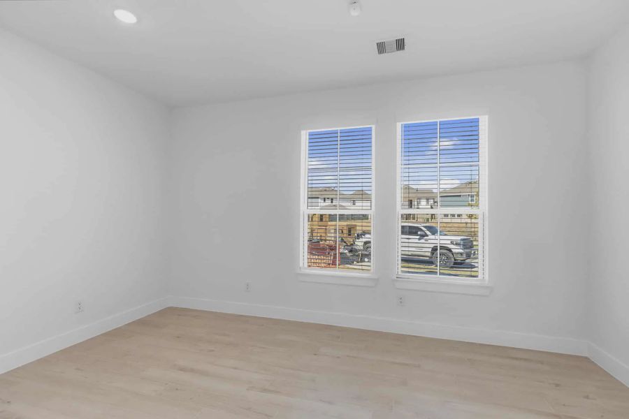 Representative unfurnished interior of a home built from the Springfield by Chesmar Homes in Bridgeland, Elgin (Image 20).