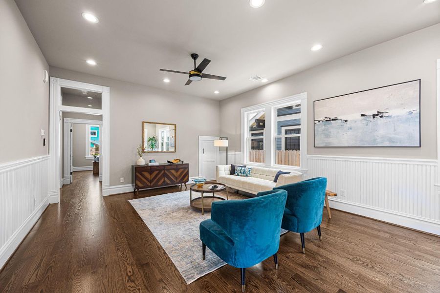 The 1st floor living anchors this space and welcomes guests from the entry foyer. The 1st floor living anchors this space and welcomes guests from the entry foyer.