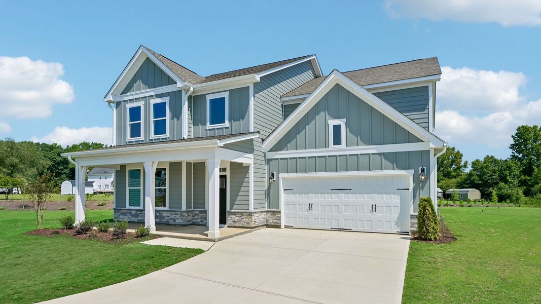 Representative exterior photo of a completed home built from the Jordan by D.R. Horton in Eagle Creek, Fuquay Varina, NC (Image 2). Representative exterior photo of a completed home built from the Jordan by D.R. Horton in Eagle Creek, Fuquay Varina, NC (Image 2).