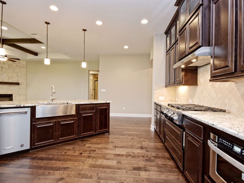 Representative furnished interior of a home built from the Madera II by Giddens Homes in Scofield Farms Estates, Georgetown (Image 212).