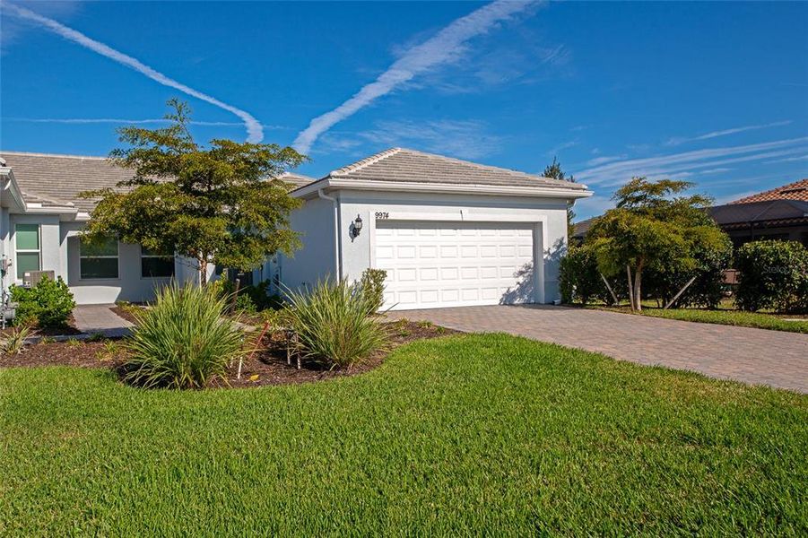 Front exterior of a new home in , Englewood, FL, highlighting curb appeal (Image 26).