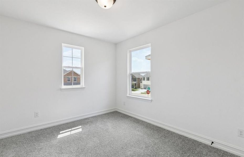 Secondary bedroom designed with generous storage solutions   *Real home pictured