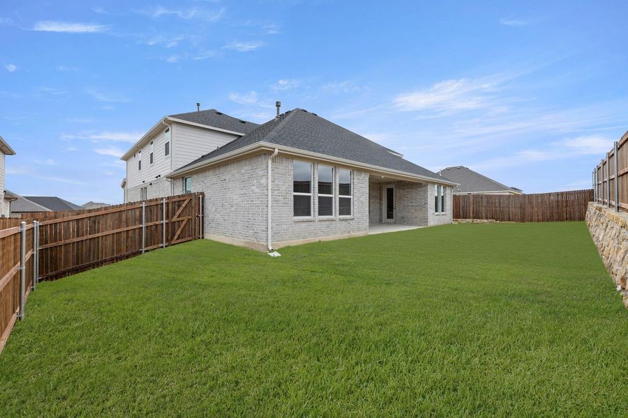 Exterior details and patio area of a home in View at the Reserve, Mansfield (Image 17). Exterior details and patio area of a home in View at the Reserve, Mansfield (Image 17).