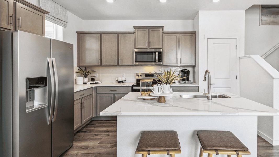 Representative furnished interior of a home built from the Muirfield by D.R. Horton in Arcadia, Denver (Image 6).