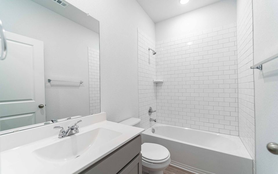 Furnished interior view inside a new home in Municipal Drive Townhomes, Leander (Image 7). Furnished interior view inside a new home in Municipal Drive Townhomes, Leander (Image 7).