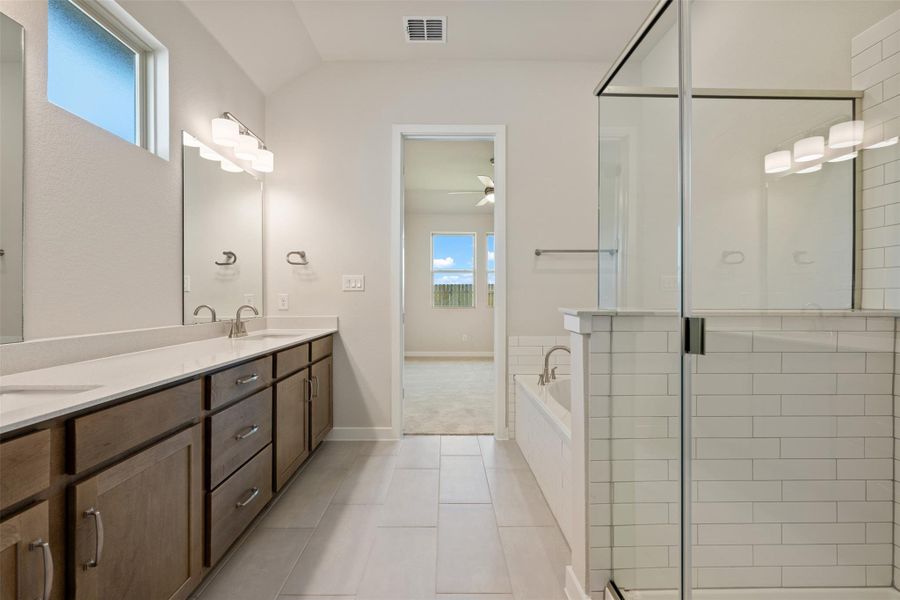 Furnished interior view inside a new home in The Trails at Carmel, Pflugerville (Image 12).