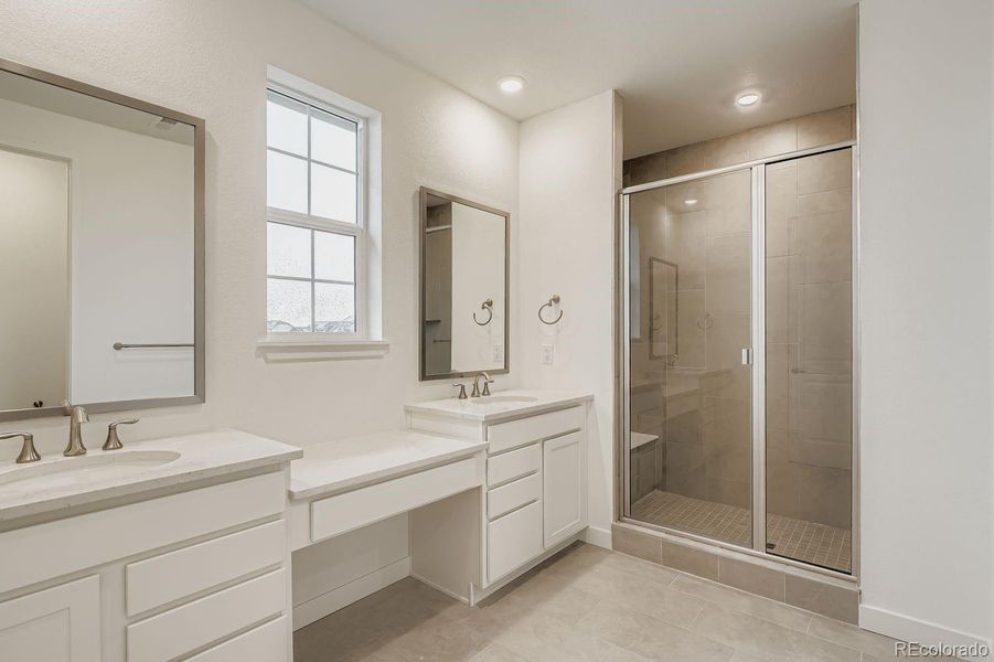 Furnished interior view inside a new home in Sunset Village: The Grand Collection, Erie (Image 6). Furnished interior view inside a new home in Sunset Village: The Grand Collection, Erie (Image 6).