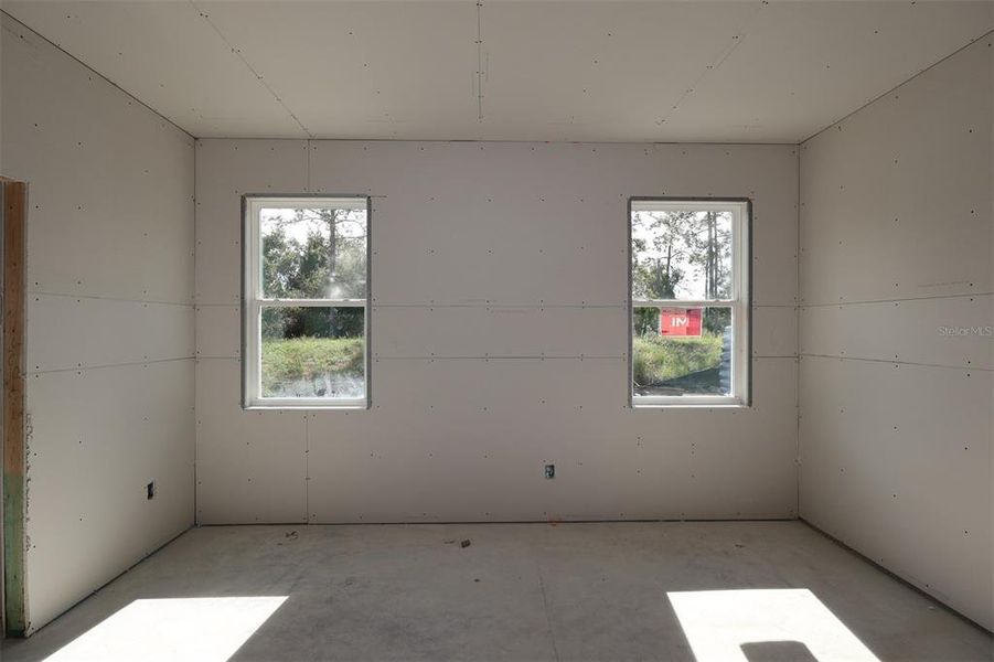 In-progress construction of a new home in Eden at Crossprairie, St. Cloud, FL (Image 5).