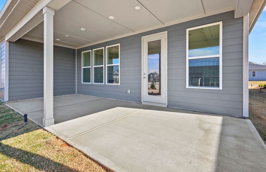 Exterior details and patio area of a home in Carolina Riverside, Belmont (Image 4).