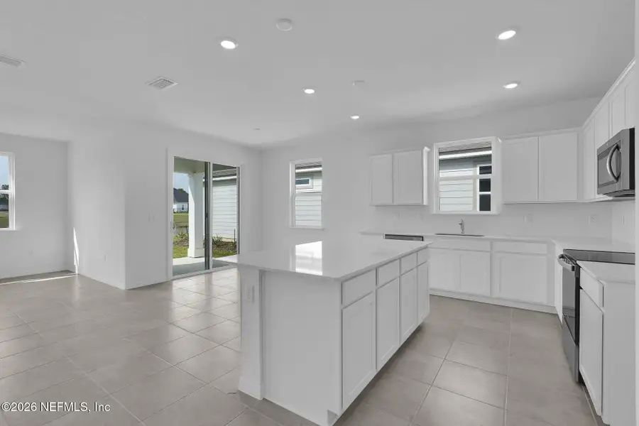 Furnished interior view inside a new home in Hyland Trail, Green Cove Springs (Image 4).