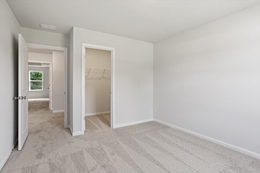Spacious, unfurnished interior of a new home in Cambridge Reserve, Angier (Image 31).