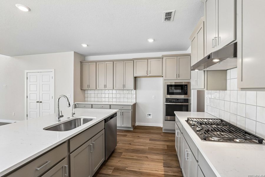 Furnished interior view inside a new home in Weston Oaks, San Antonio (Image 11).