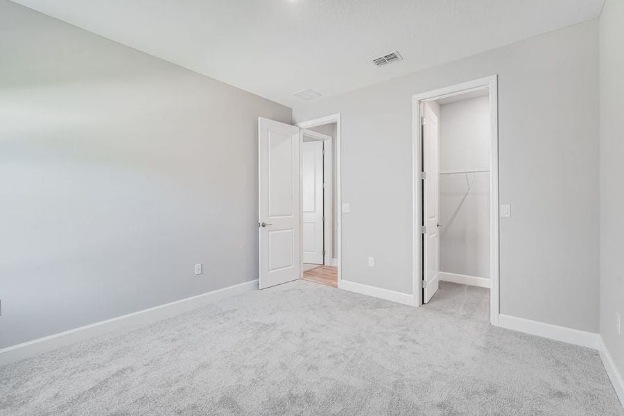Representative unfurnished interior of a home built from the Maui by Taylor Morrison in Timber Ridge, Plant City (Image 10).
