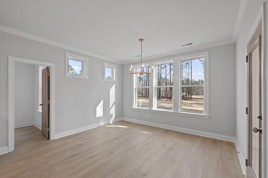 Representative unfurnished interior of a home built from the The Hampton by RobuckHomes in Baylee Ridge, Selma (Image 145).