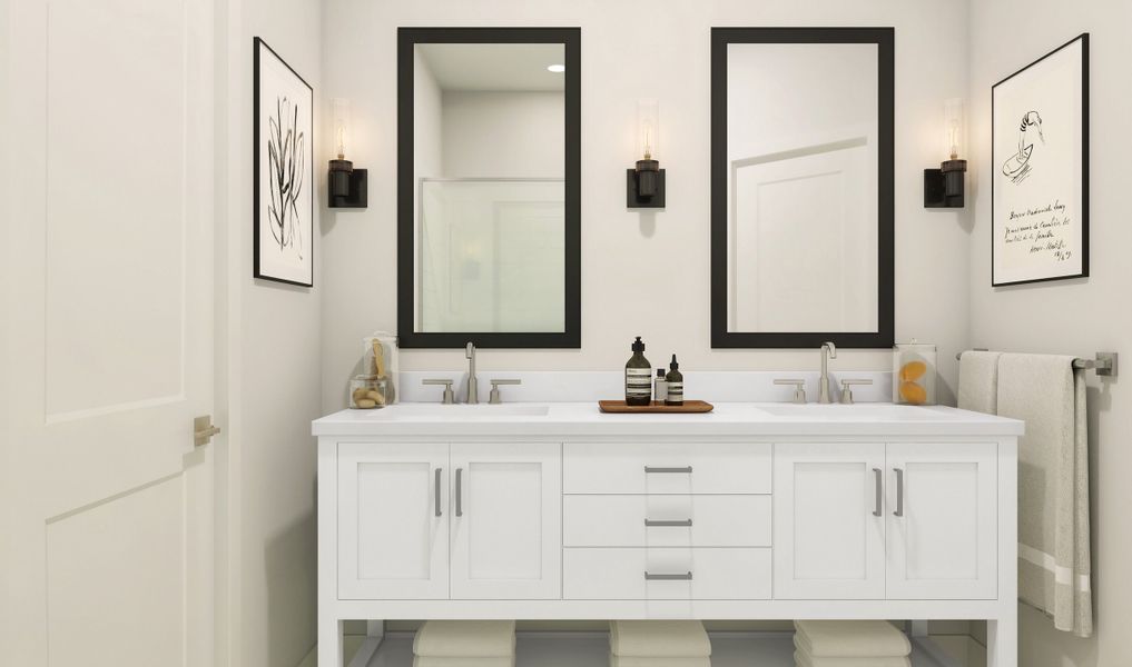 Primary bath with dual sinks and chrome fixtures throughout