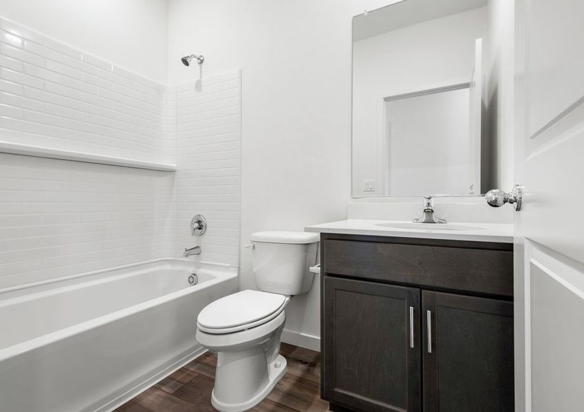 The secondary bathrooms are spacious for guests to get ready.