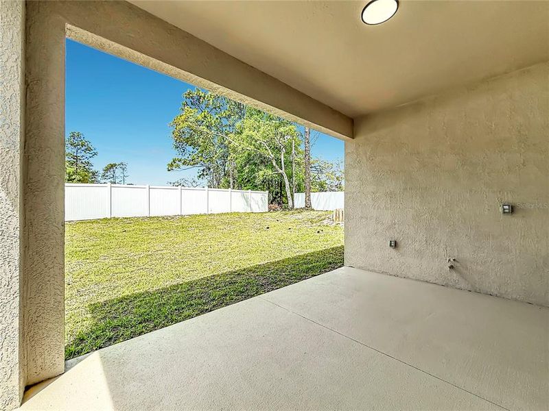 Exterior details and patio area of a home in , Citrus Springs (Image 26).