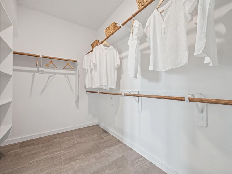 Primary walk-in closet (*Photo not of actual home and used for illustration purposes only.)