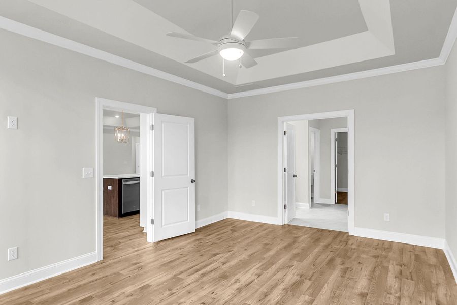 Spacious, unfurnished interior of a new home in Tidewater at Lakes of Cane Bay, Summerville (Image 28).