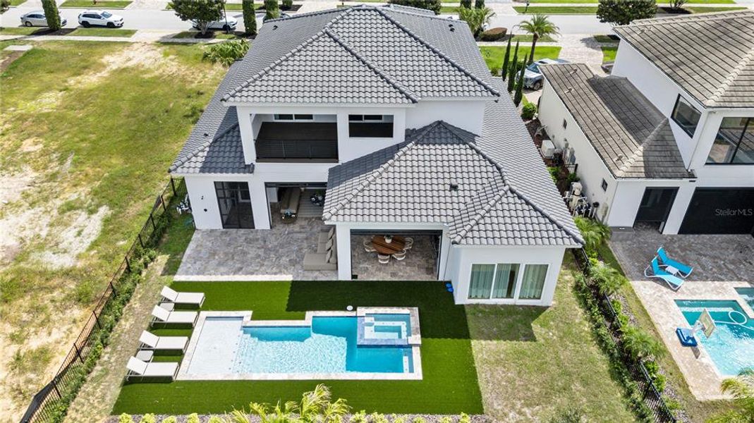 Exterior details and patio area of a home in Bella Collina, Montverde (Image 23).