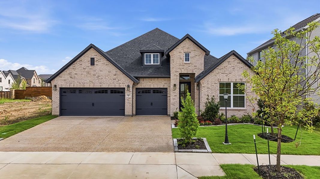 Front exterior of a new home in Solterra Texas, Mesquite, TX, highlighting curb appeal (Image 24).