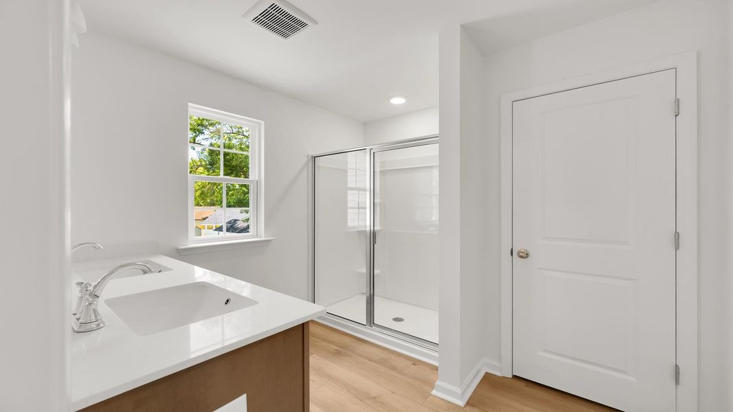Furnished interior view inside a new home in Creekside at Andrews, Summerville (Image 10). Furnished interior view inside a new home in Creekside at Andrews, Summerville (Image 10).
