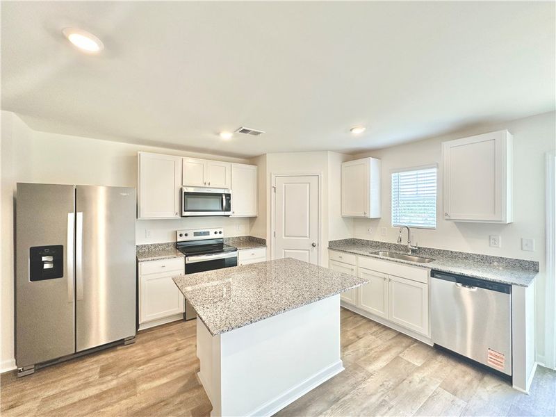 Furnished interior view inside a new home in Champions Village at Cherry Hill, Pendleton (Image 8).