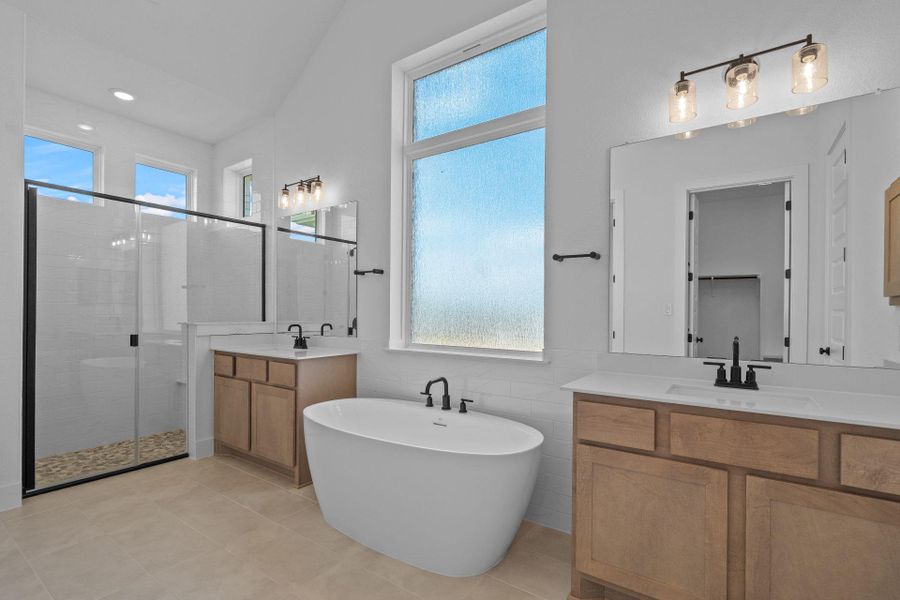 Primary Bath retreat with dual vanities & soaking tub Primary Bath retreat with dual vanities & soaking tub