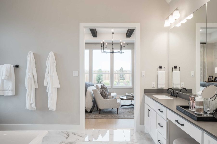 Representative furnished interior of a home built from the Milan by Tri Pointe Homes in Dunham Pointe, Cypress (Image 12).