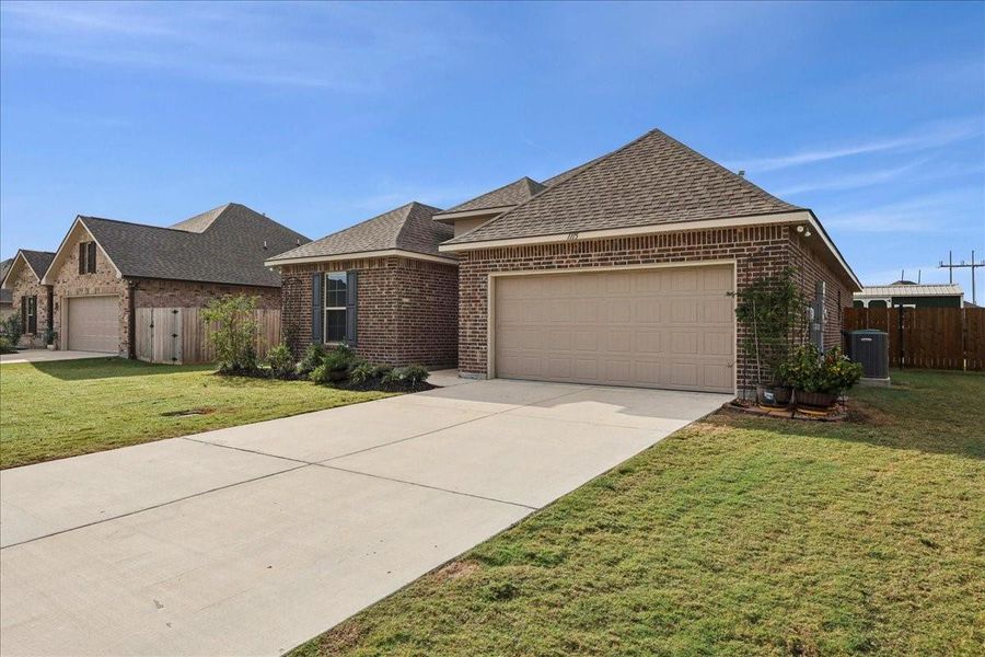 Front exterior of a new home in , Orange, TX, highlighting curb appeal (Image 1). Front exterior of a new home in , Orange, TX, highlighting curb appeal (Image 1).