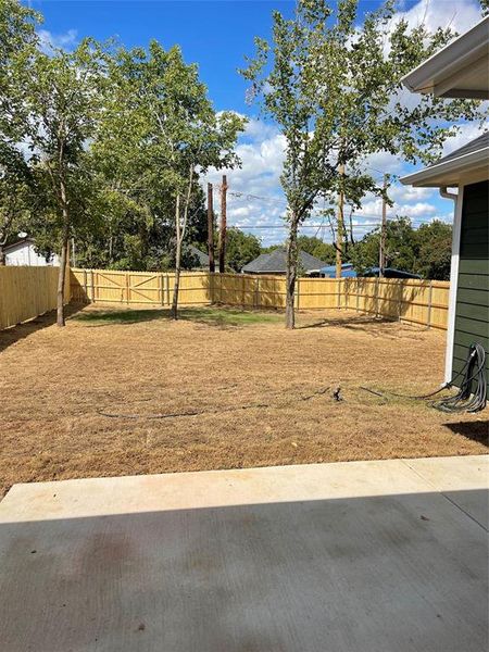 View of yard with a patio area