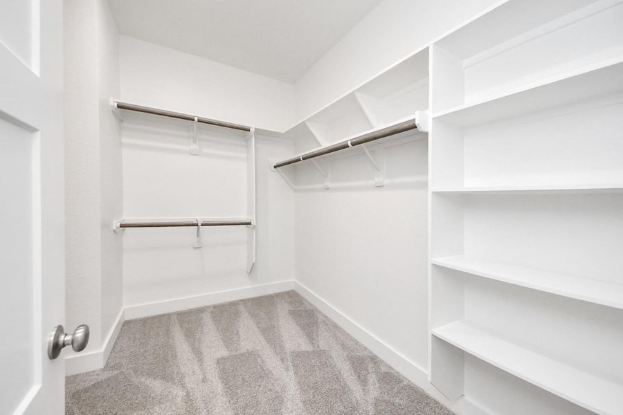 Spacious, unfurnished interior of a new home in Sunterra: Landmark Collection, Katy (Image 31).