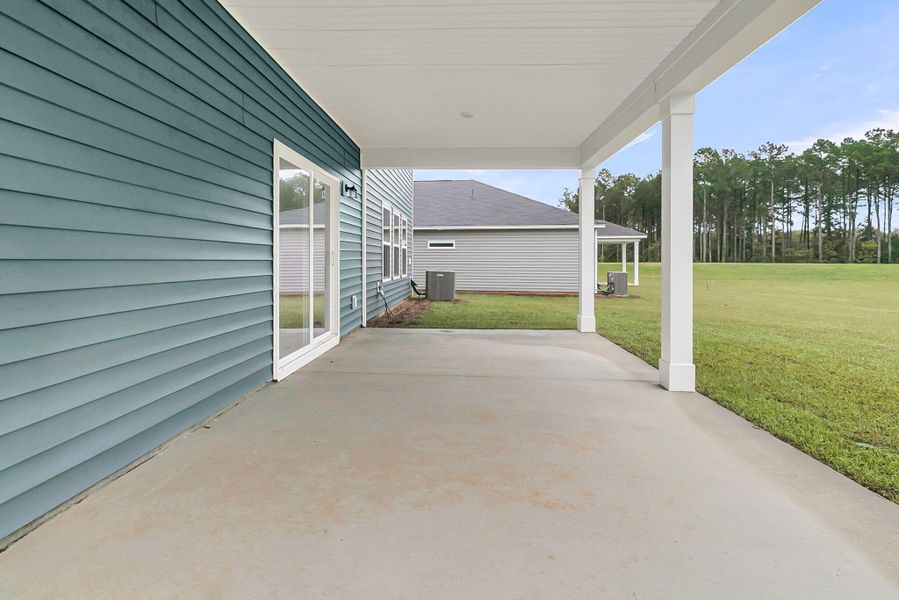 Exterior details and patio area of a home in Watson Hill, Summerville (Image 32).