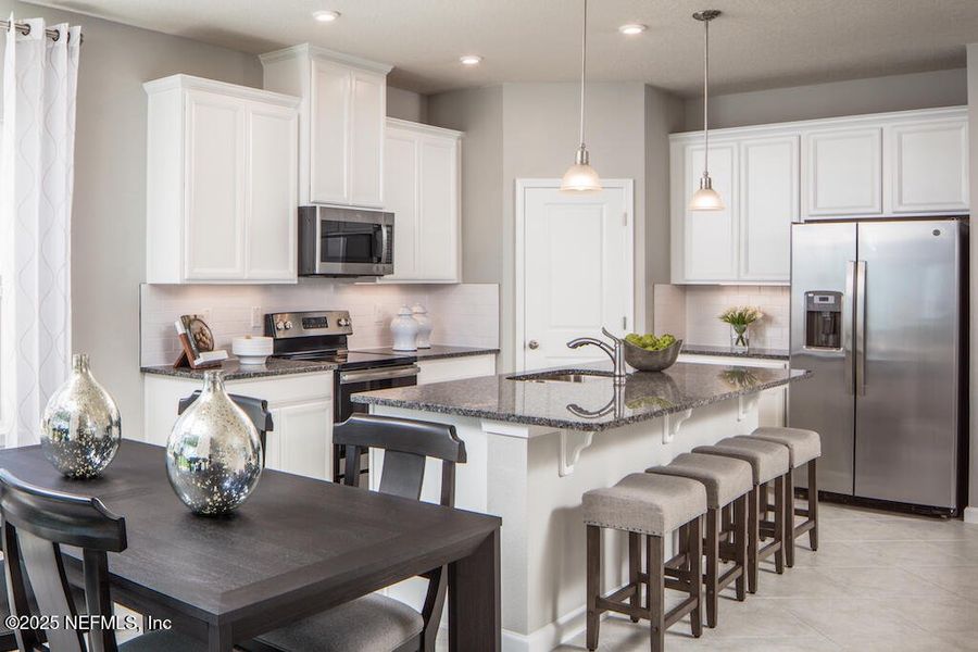 Furnished interior view inside a new home in Seminole Palms Single-Family Homes, Palm Coast (Image 11).