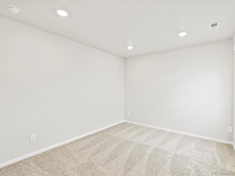 Spacious, unfurnished interior of a new home in Buffalo Highlands: The Flora Collection, Commerce City (Image 12).