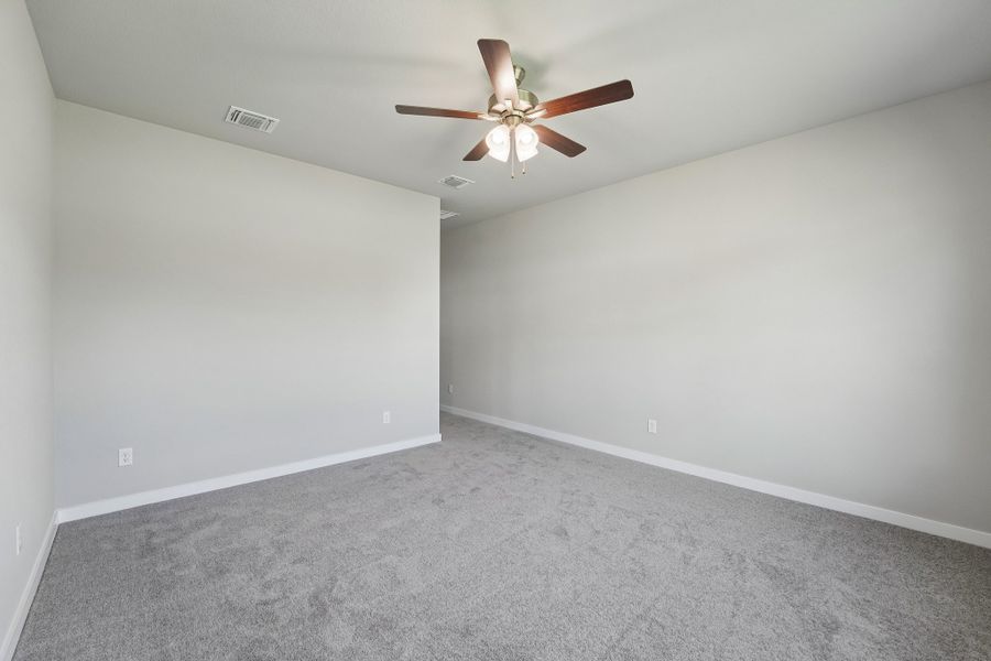 Representative unfurnished interior of a home built from the Guadalupe by Omega Builders in Hillside Village, Temple (Image 11).