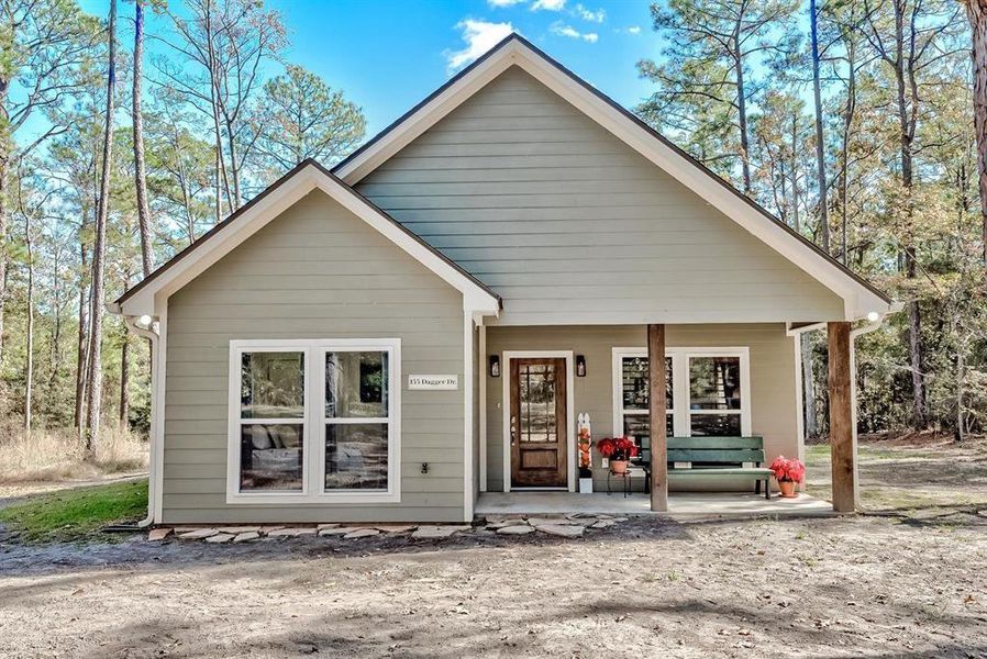 Front exterior of a new home in , Brookeland, TX, highlighting curb appeal (Image 21).