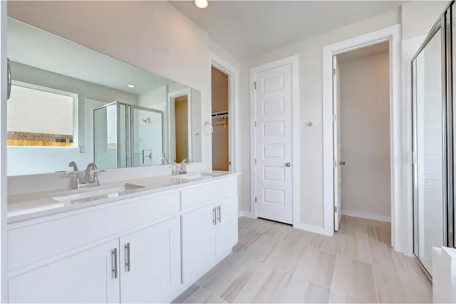 Representative furnished interior of a home built from the Travis by Scott Felder Homes in Flora, Hutto (Image 5).