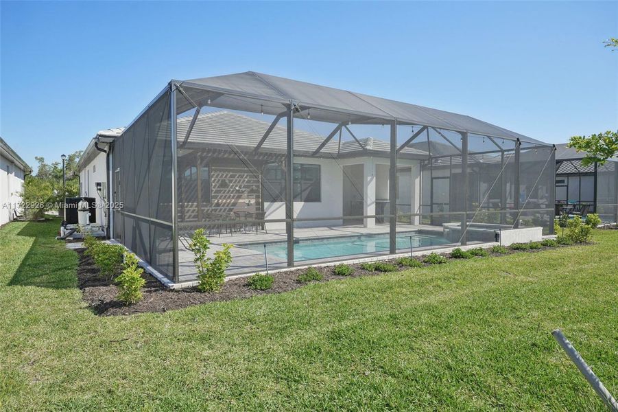 Exterior details and patio area of a home in , Fort Myers (Image 23). Exterior details and patio area of a home in , Fort Myers (Image 23).