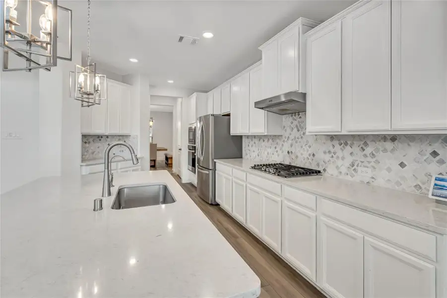 Furnished interior view inside a new home in Harper's Preserve - Classic Series, Conroe (Image 7). Furnished interior view inside a new home in Harper's Preserve - Classic Series, Conroe (Image 7).