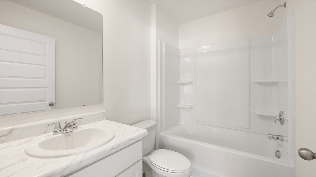 Representative unfurnished interior of a home built from the Mansfield by D.R. Horton in Brooks Station, Dacula (Image 35).