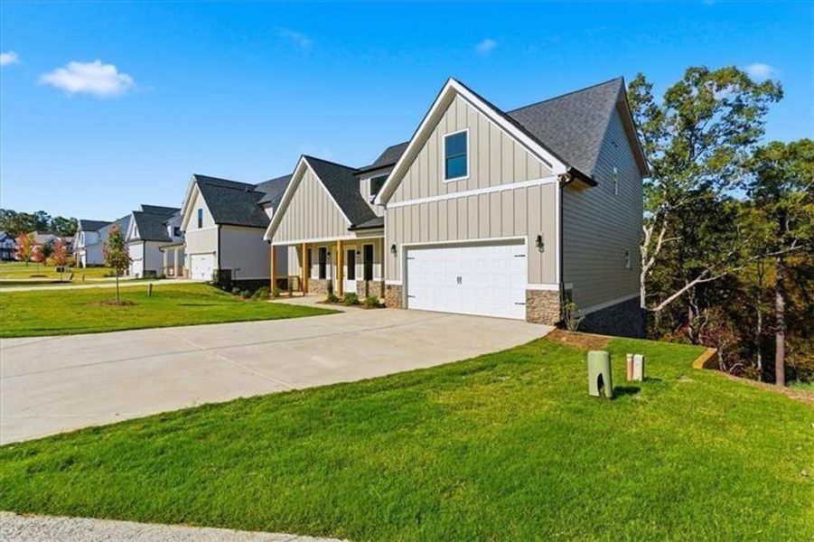 Front exterior of a new home in , Cartersville, GA, highlighting curb appeal (Image 1). Front exterior of a new home in , Cartersville, GA, highlighting curb appeal (Image 1).