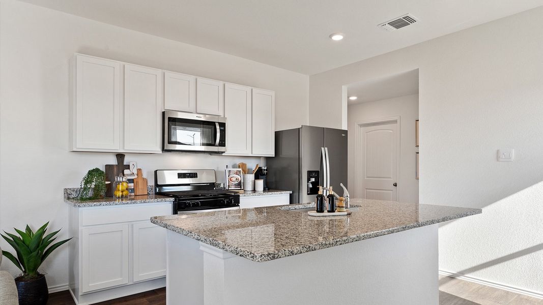 Furnished interior view inside a new home in Watermill, Kyle (Image 6).
