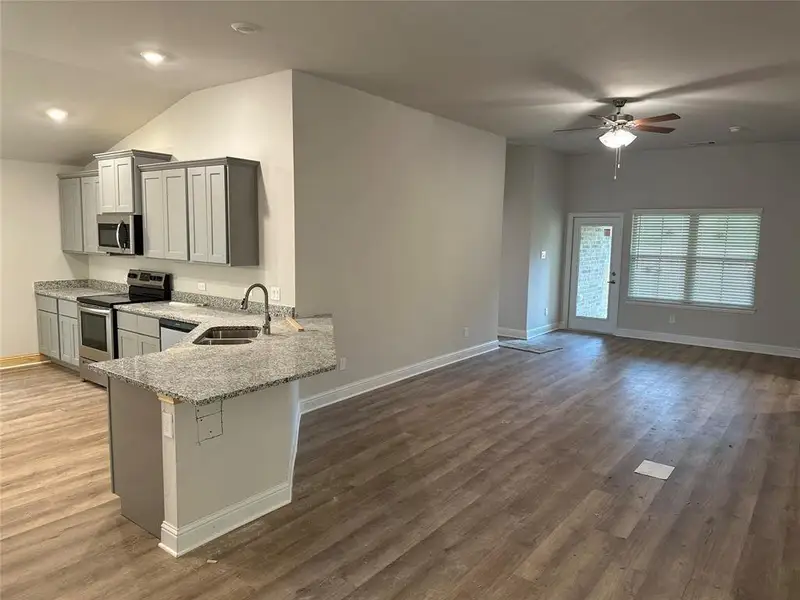 Furnished interior view inside a new home in Kiber Reserve, Angleton (Image 4).